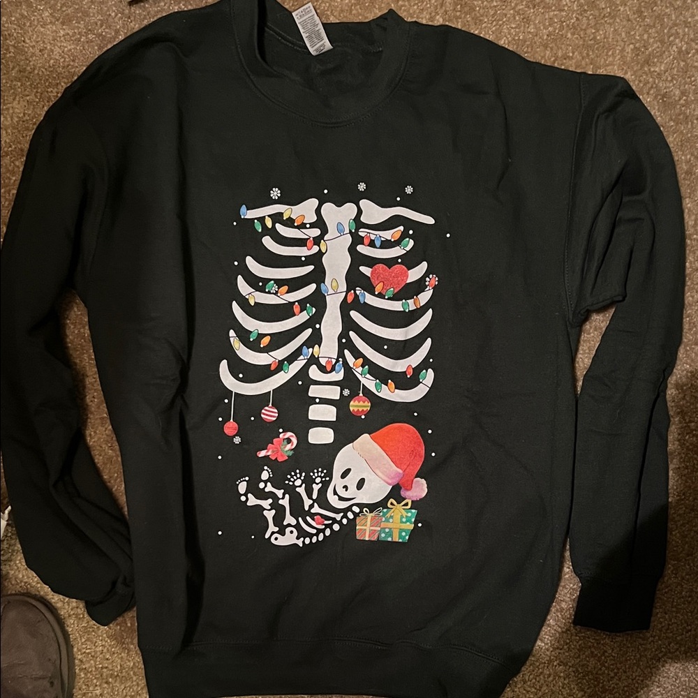 Holiday pregnancy sweatshirt.